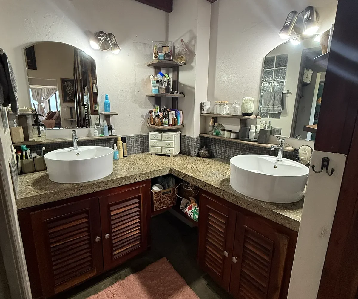 Bathroom with double vessel sinks at Casa Cerca del Cielo, Rancho Santana
