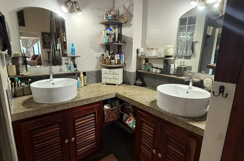 Bathroom with double vessel sinks at Casa Cerca del Cielo, Rancho Santana