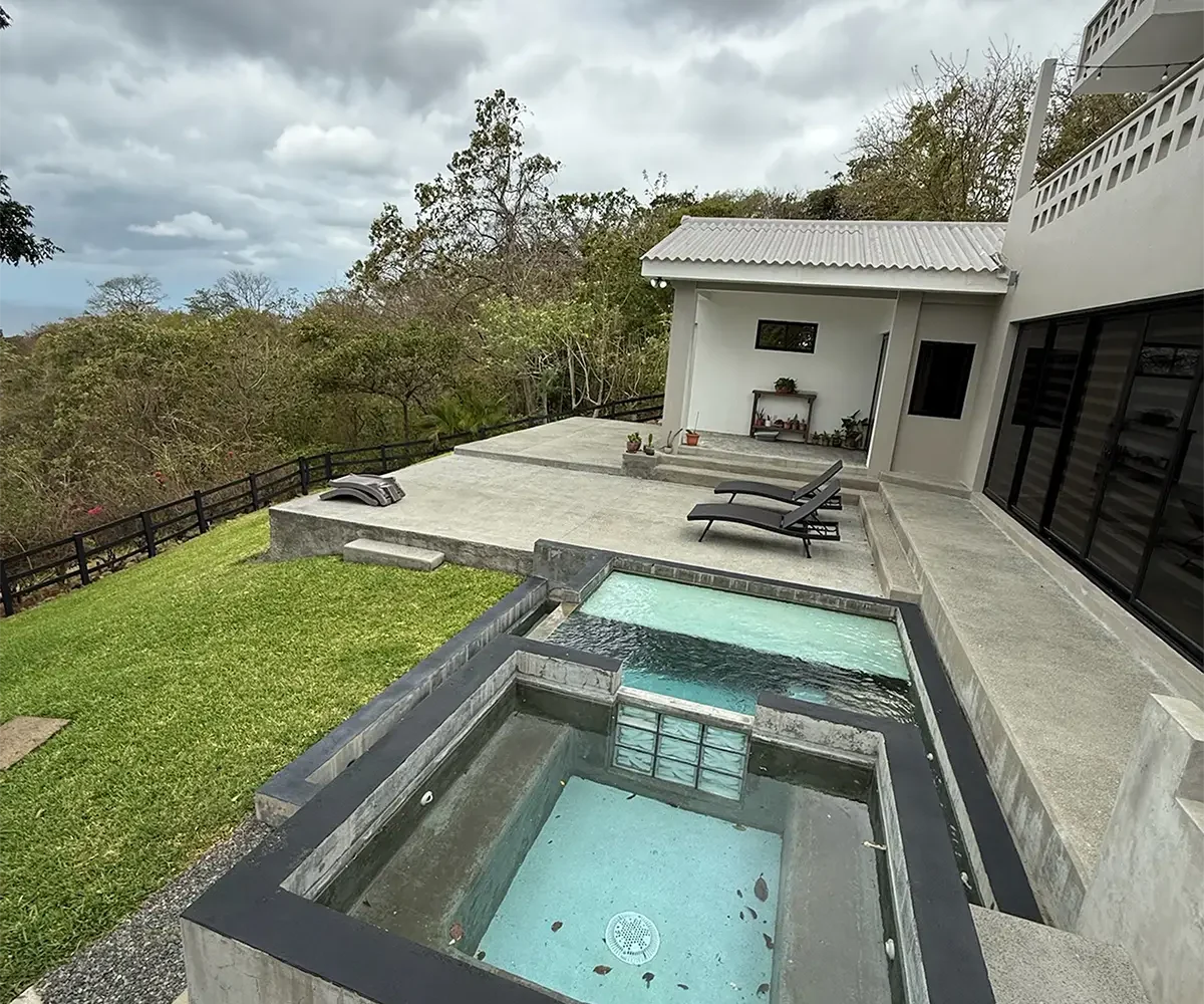 Pool, hot tub and garden at Casa Cerca del Cielo, Rancho Santana home for sale